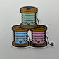 Cute Thread Spool Trio Sticker